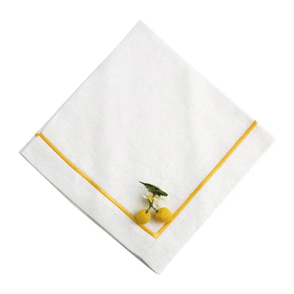 Yellow Lined Pure Linen Dinner Napkin - Set of 2, featuring white linen with yellow border, adorned with crocheted lemons and flower in corner, ideal for elegant dining.