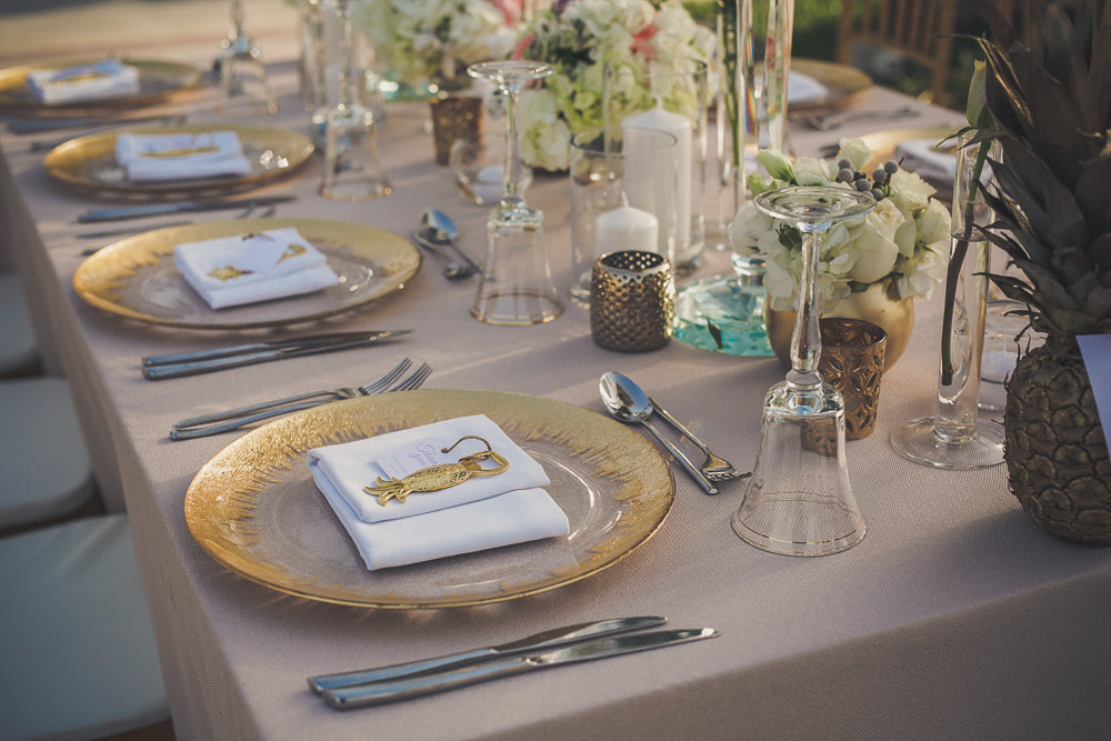 CHARGER PLATE - GOLD SKYLINE: Elegant glass charger plate with gold skyline design on the rim, enhancing any table setting, ideal for upscale events.