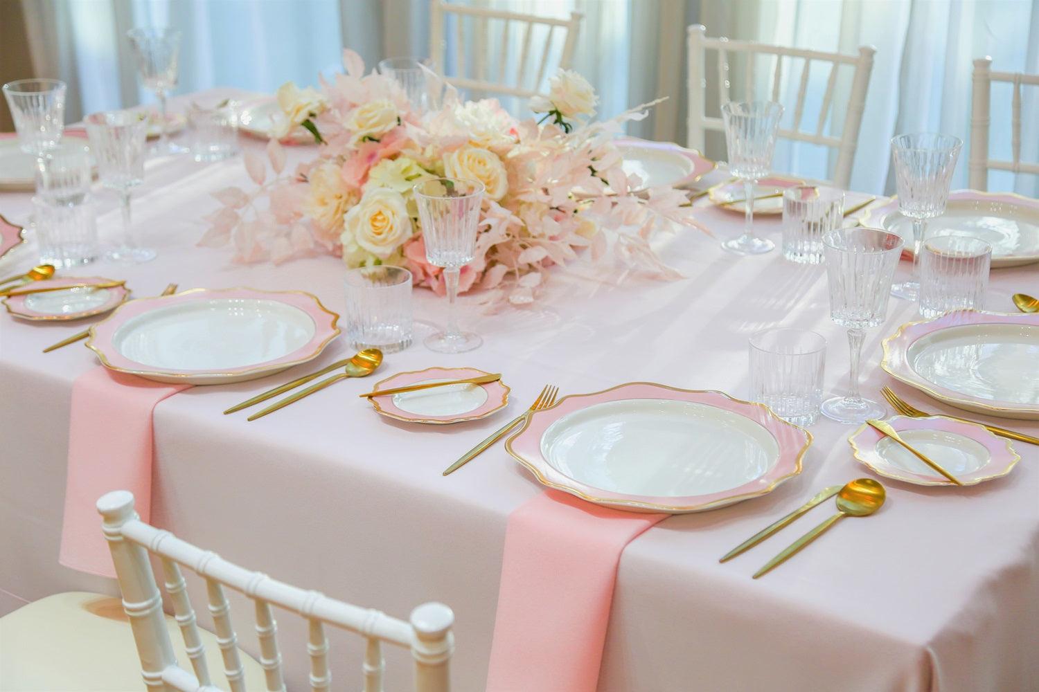 Pink Elegance table setup with plates, glasses, and centrepieces for a party of 8. Rent all party essentials from Party Social.