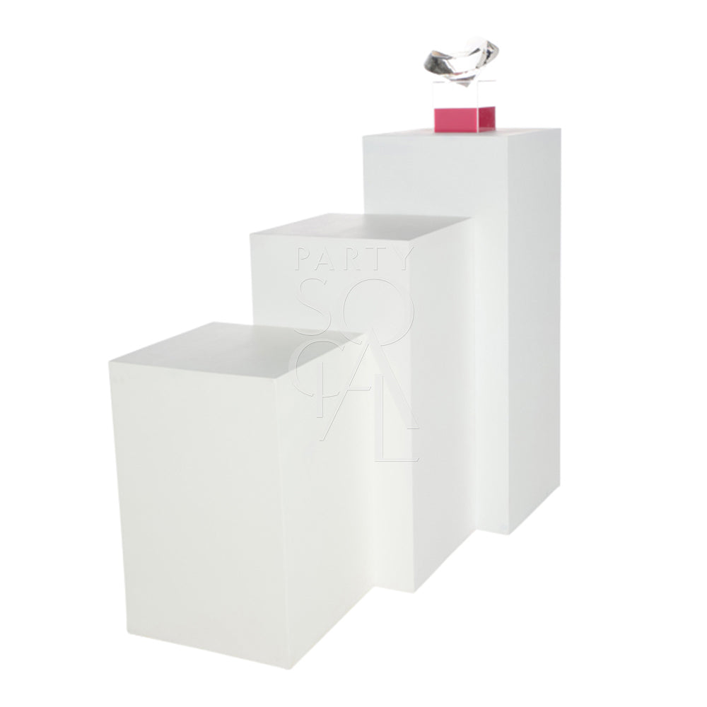 Square white podium with a crystal on top, suitable for weddings and birthdays. Lightweight and durable, ideal for event displays and celebrations.