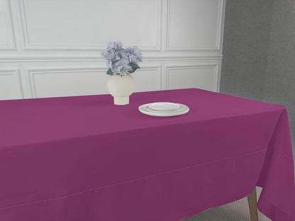 A simple, lightweight tablecloth with a white plate and a vase of flowers. Perfect for any table setting.