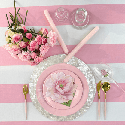 Alt text: Ruffles Glass Candle Holder on a table setting with pink plates and flowers, perfect for elegant party decor.