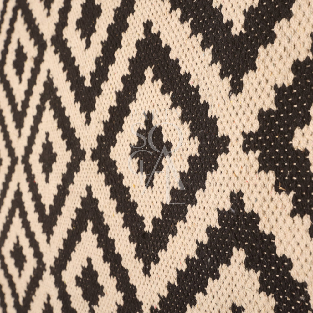 RUG DIAMOND PRINT featuring a close-up of black and white knitted diamond pattern, ideal for enriching event settings with its elegant textile design.