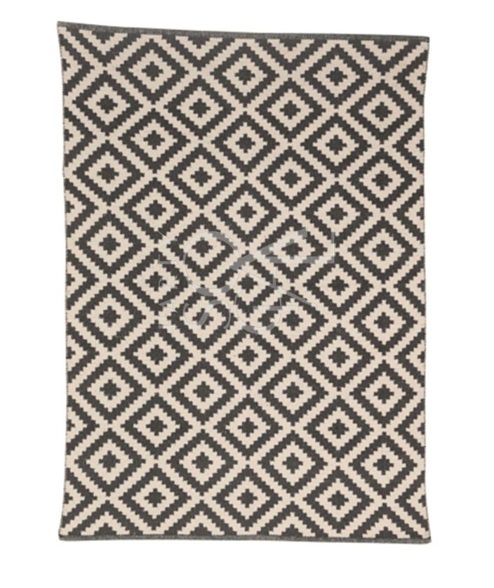 RUG DIAMOND PRINT, featuring a black and white diamond pattern, ideal for events. Available in two sizes, enhancing any party setting.