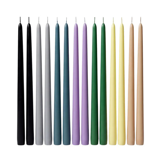 A set of ten taper candles in assorted colors, including black, gray, blue, purple, green, yellow, and beige, arranged in a row against a plain white background.