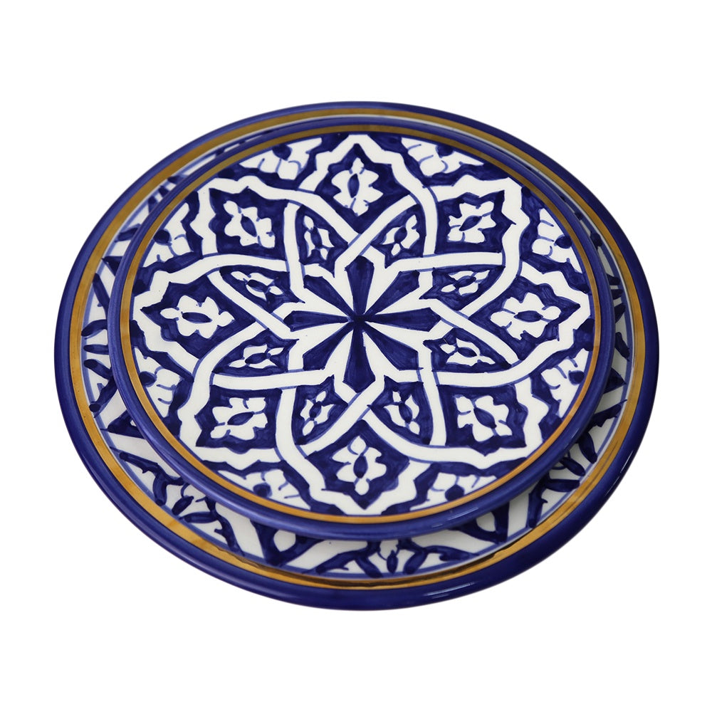 A stack of Marrakesh patterned ceramic plates for various table settings.
