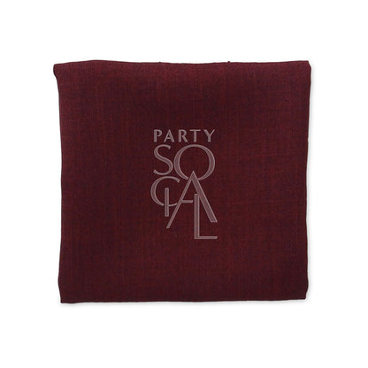 A red linen blend napkin, perfect for events. Elevate your table setting with this premium napkin from Party Social. Dimensions: 25cm x 25cm. Starting at 48 AED. Napkins from Party Social Dubai.