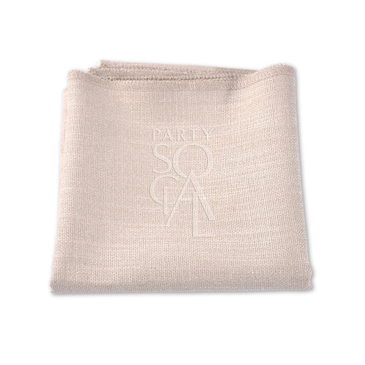 A folded linen blend napkin, ideal for events. Elevate your table setting with premium napkins in various colors. Perfect for weddings, dinners, and special occasions. Dimensions: 50cm L x 50cm W. Napkins from Party Social Dubai.