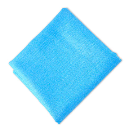 Linen blend napkin folded in aqua, ideal for events. Elevate your table setting with premium napkins. Available in various colors. Dimensions: Cocktail 25cm x 25cm, Dinner 50cm x 50cm. From Party Social. Napkins from Party Social Dubai.