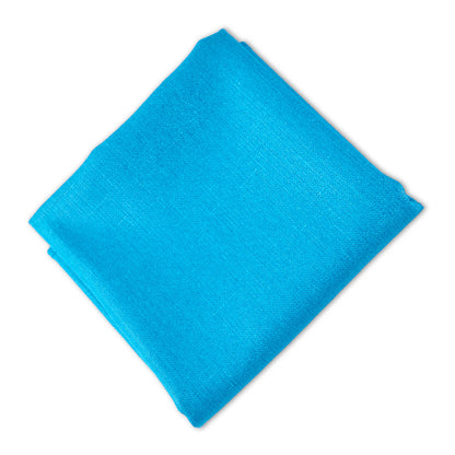 Folded blue linen blend napkin by Party Social. Elevate your table setting with premium napkins for any event. Available in cocktail (25cm) and dinner (50cm) sizes. Napkins from Party Social Dubai.