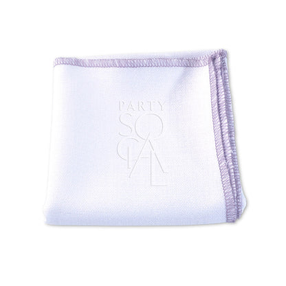 A premium linen blend napkin with purple trim, perfect for adding elegance to any event. Available in various colors. Ideal for weddings, dinner parties, and special occasions. Dimensions: 50cm L x 50cm W. Napkins from Party Social Dubai.