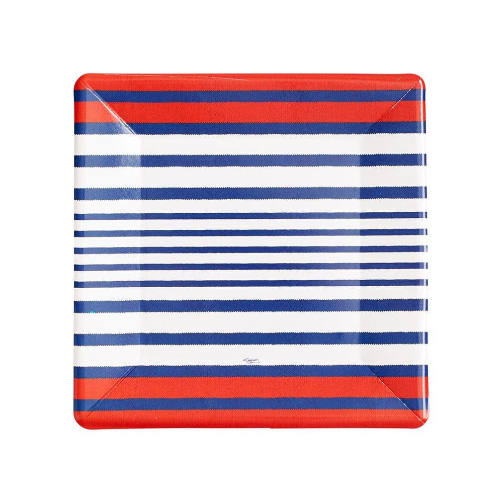 A square plate with red and blue stripes, perfect for elevating your table setting. Made from durable paperboard, these Breton Stripe Blue Salad &amp; Dessert Plates are ideal for any occasion.
