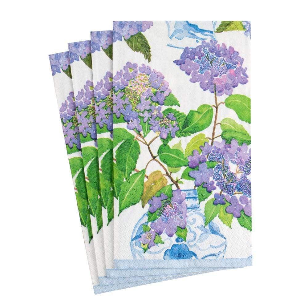 Hydrangeas and Porcelain Paper Guest Towel Napkins - 15 Per Package. A stack of paper napkins adorned with purple hydrangea illustrations.