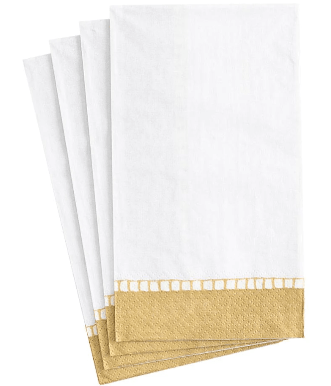 Linen Border Paper Guest Towel Napkins in Gold - 15 Per Package, a stack of elegant and eco-friendly napkins for any occasion. Triple-ply, FSC-certified, and made with nontoxic dyes.